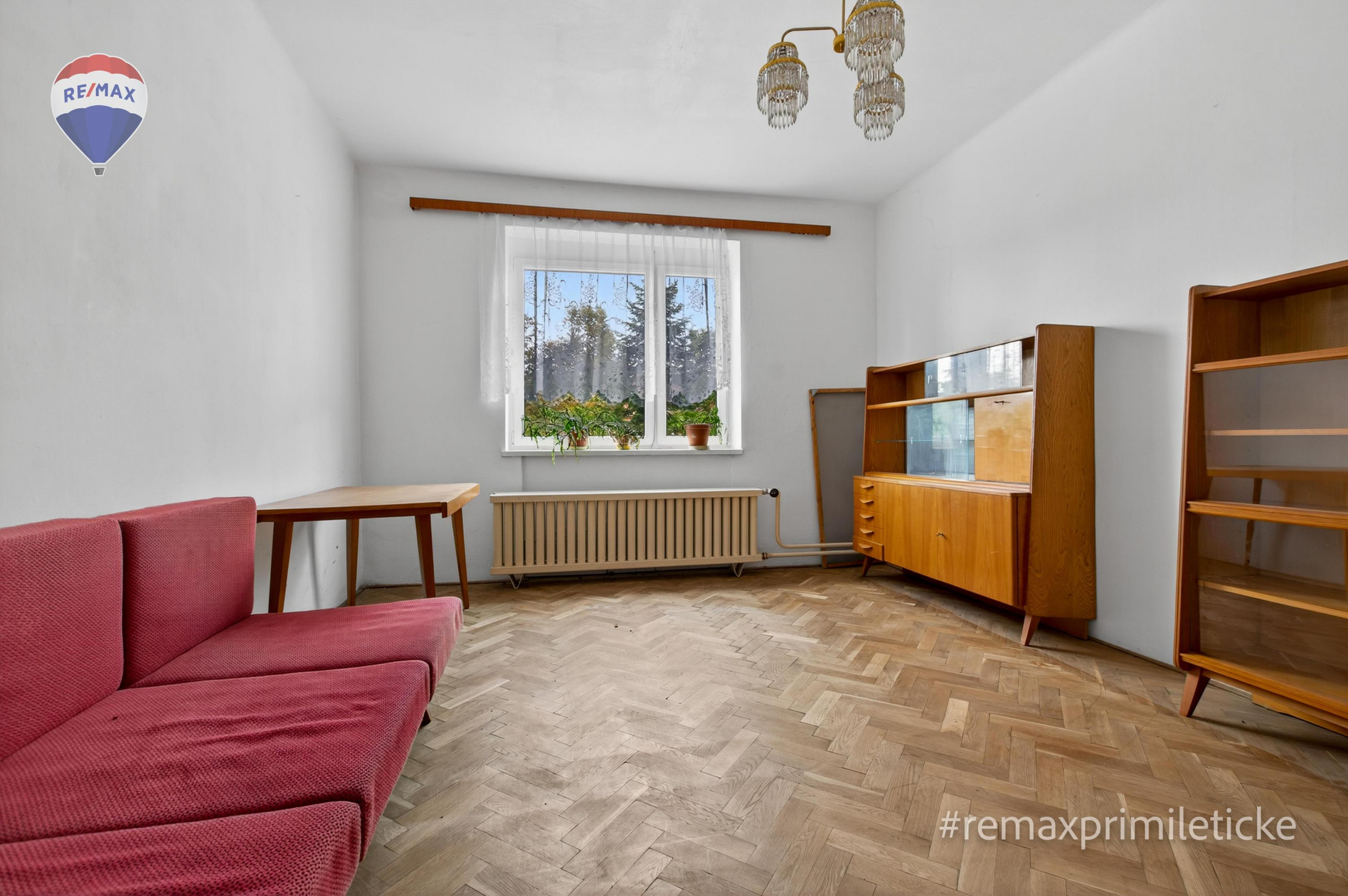 Rodinny dom s veľkým pozemkom v centre obce