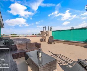 Na predaj veľkometrážny mezonet s terasou a garážou