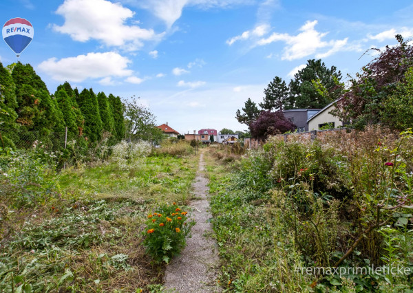 Rodinny dom s veľkým pozemkom v centre obce