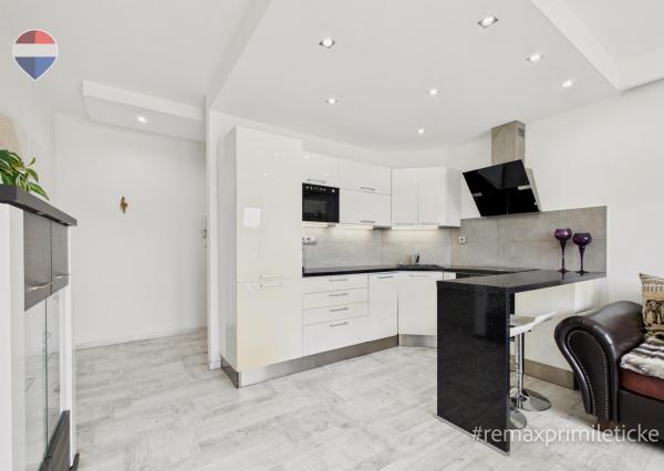 Priestranný 2-izbový byt, 46 m² s terasou a parkovaním
